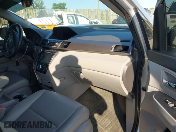 2014 Honda Odyssey Touring with VIN 5FNRL5H95EB108427, listed as a IAAI auction lot 39992643 with 100,658 mi miles and . Bid and sale history available at DreamBid. Image 5.