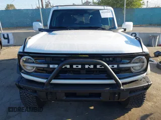 2021 Ford Bronco z VIN 1FMEE5DP7MLA93692, wystawiony jako IAAI lot #42222219 z przebiegiem 18 982 mil mil oraz . Historia ofert i sprzedaży dostępna na DreamBid. Obrazek 13.
