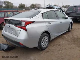 2022 Toyota Prius L Eco with VIN JTDKAMFU9N3185999, listed as a IAAI auction lot 41428106 with 50,798 mi miles. Bid and sale history available at carsss.com. Image 4.