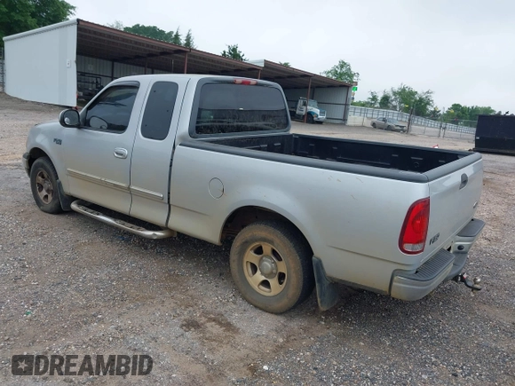 2000 Ford F-150 XL with VIN 1FTZX1725YNC17400, listed as a IAAI auction lot 42031955 with 1 mi miles. Bid and sale history available at carsss.com. Image 3.