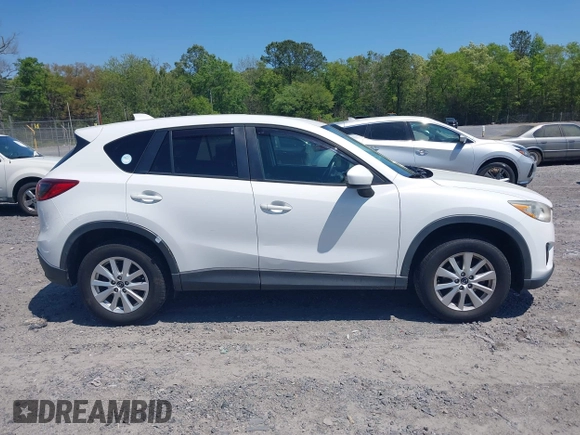 2013 Mazda CX-5 Touring with VIN JM3KE4CE8D0156843, listed as a IAAI auction lot 42018321 with 143,396 mi miles. Bid and sale history available at carsss.com. Image 13.