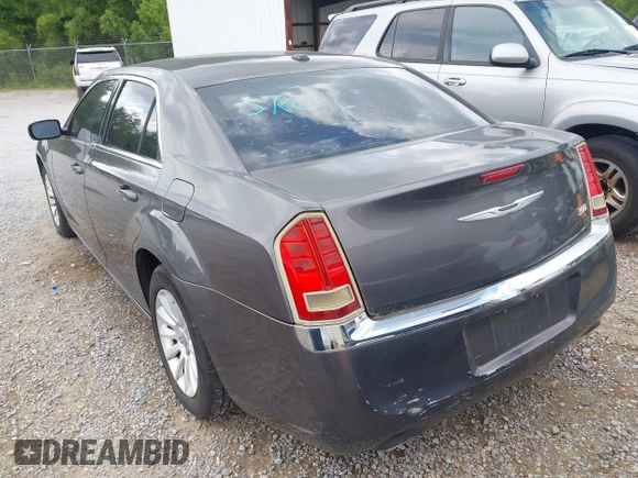2013 Chrysler 300 with VIN 2C3CCAAG4DH588190, listed as a IAAI auction lot 42476895 with 224,837 mi miles and . Bid and sale history available at DreamBid. Image 3.