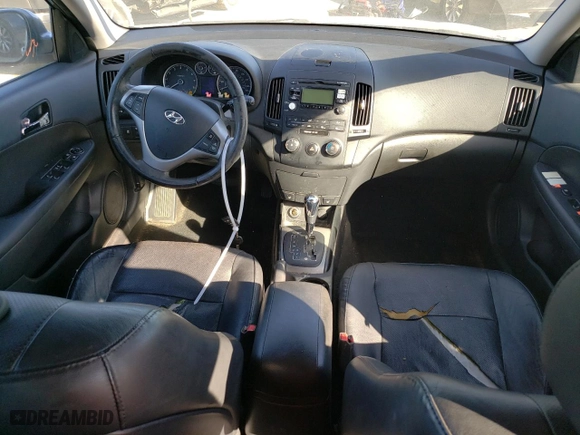 2012 Hyundai Elantra Touring SE with VIN KMHDC8AE8CU128769, listed as a Copart auction lot 75792614 with 106,201 mi miles and Salvage Title. Bid and sale history available at carsss.com. Image 8.