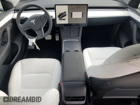 2024 Tesla Model Y Performance with VIN 7SAYGDEF7RF093054, listed as a Copart auction lot 50747985 with 26,907 mi miles and Salvage Title. Bid and sale history available at DreamBid. Image 8.