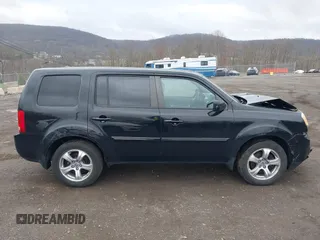 2012 Honda Pilot EX-L with VIN 5FNYF4H57CB068021, listed as a IAAI auction lot 41909996 with 253,542 mi miles and . Bid and sale history available at carsss.com. Image 13.