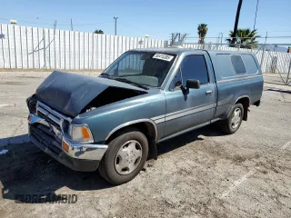 1994 Toyota Pickup DLX z VIN 4TARN81P2RZ175695, wystawiony jako Copart lot #50415385 z przebiegiem 258 048 mil mil oraz Szkoda całkowita • Salvage title. Historia ofert i sprzedaży dostępna na DreamBid. Obrazek 1.