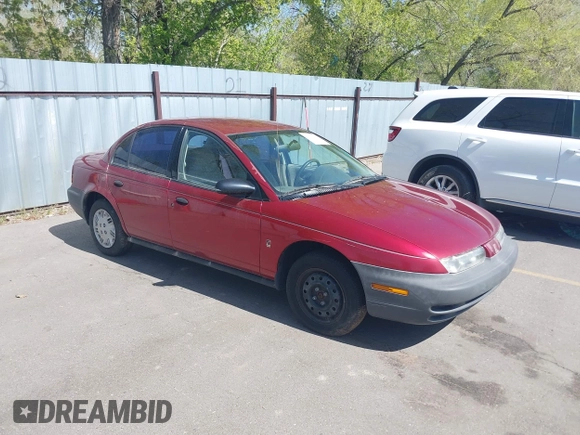 1996 Saturn SL with VIN 1G8ZG5289TZ214790, listed as a IAAI auction lot 42090262 with 197,485 mi miles. Bid and sale history available at carsss.com. Image 1.