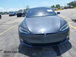 2016 Tesla Model S 70 with VIN 5YJSA1E16GF156312, listed as a IAAI auction lot 42469451 with 90,317 mi miles and . Bid and sale history available at DreamBid. Image 13.