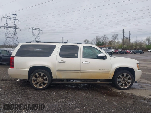 2010 Chevrolet Suburban LTZ with VIN 1GNUKKE35AR129351, listed as a IAAI auction lot 41971625 with 234,487 mi miles. Bid and sale history available at carsss.com. Image 13.