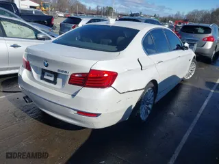 2015 BMW 5 Series 528i with VIN WBA5A5C53FD523146, listed as a IAAI auction lot 41738947 with 77,804 mi miles. Bid and sale history available at carsss.com. Image 4.