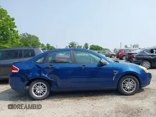 2008 Ford Focus SE z VIN 1FAHP35N48W230014, wystawiony jako IAAI lot #42395069 z przebiegiem 140 179 mil mil oraz . Historia ofert i sprzedaży dostępna na DreamBid. Obrazek 13.