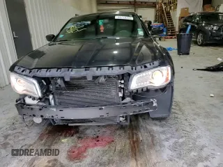 2013 Chrysler 300 z VIN 2C3CCAAG8DH727074, wystawiony jako Copart lot #55718345 z przebiegiem 92 228 mil mil oraz Szkoda całkowita • Salvage title. Historia ofert i sprzedaży dostępna na DreamBid. Obrazek 13.