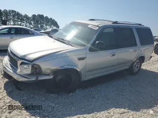 1999 Ford Expedition XLT with VIN 1FMRU1768XLB27899, listed as a Copart auction lot 72585094 with 311,375 mi miles and Salvage title. Bid and sale history available at DreamBid. Image 1.