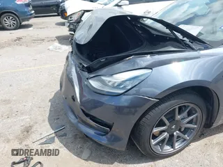 2020 Tesla Model 3 Long Range z VIN 5YJ3E1EB5LF801592, wystawiony jako IAAI lot #42096859 z przebiegiem 68 002 mil mil oraz . Historia ofert i sprzedaży dostępna na DreamBid. Obrazek 6.