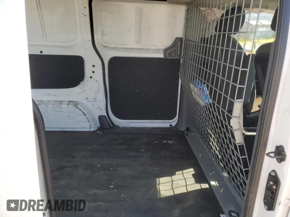 2018 Nissan NV200 SV z VIN 3N6CM0KNXJK700111, wystawiony jako Copart lot #53747595 z przebiegiem Nie podano mil oraz Szkoda całkowita • Salvage title. Historia ofert i sprzedaży dostępna na DreamBid. Obrazek 11.