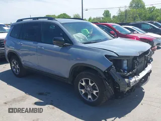 2022 Honda Passport TrailSport with VIN 5FNYF8H6XNB023013, listed as a IAAI auction lot 42274071 with 31,471 mi miles and . Bid and sale history available at DreamBid. Image 1.