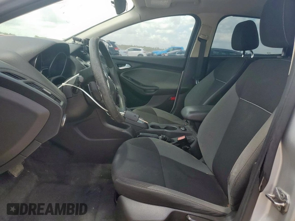 2012 Ford Focus SE with VIN 1FAHP3F29CL287498, listed as a Copart auction lot 61476855 with 139,801 mi miles and Salvage title. Bid and sale history available at DreamBid. Image 7.