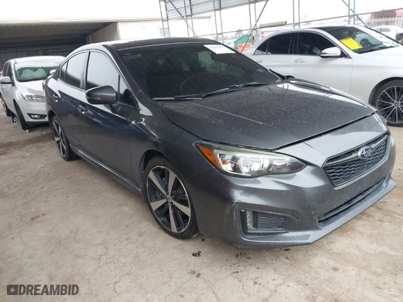 2018 Subaru Impreza Sport with VIN 4S3GKAM67J3618879, listed as a IAAI auction lot 41431925 with 84,673 mi miles. Bid and sale history available at carsss.com. Image 1.