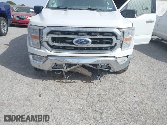 2023 Ford F-150 XL with VIN 1FTFW1E88PKD46695, listed as a IAAI auction lot 41936726 with 156,654 mi miles. Bid and sale history available at carsss.com. Image 6.