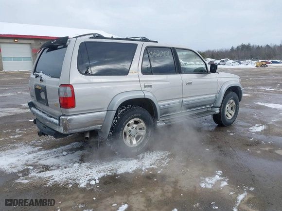 1998 Toyota 4Runner Limited with VIN JT3HN87RXW0144093, listed as a IAAI auction lot 41520901 with 205,623 mi miles. Bid and sale history available at carsss.com. Image 4.