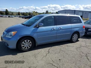 2010 Honda Odyssey EX-L with VIN 5FNRL3H75AB023925, listed as a Copart auction lot 51528745 with 134,982 mi miles and Salvage Title. Bid and sale history available at carsss.com. Image 1.