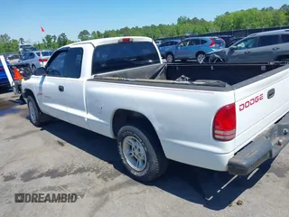 1999 Dodge Dakota SLT z VIN 1B7GL22X0XS193423, wystawiony jako IAAI lot #42053562 z przebiegiem 209 802 mil mil oraz . Historia ofert i sprzedaży dostępna na DreamBid. Obrazek 3.