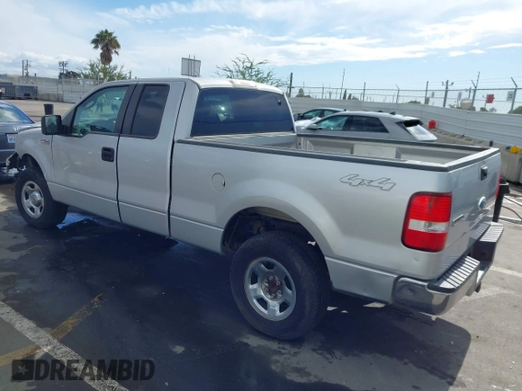 2007 Ford F-150 STX with VIN 1FTRX14W87KC40659, listed as a IAAI auction lot 41423345 with 145,811 mi miles. Bid and sale history available at carsss.com. Image 3.