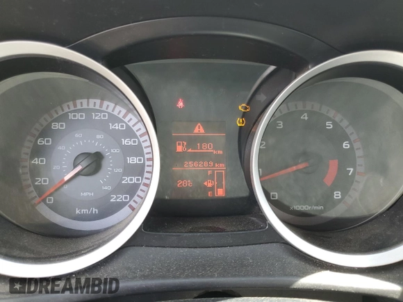 2009 Mitsubishi Lancer z VIN JA3AX88W99U613116, wystawiony jako Copart lot #58765855 z przebiegiem 256 289 mil mil oraz Czysty tytuł • Clean title. Historia ofert i sprzedaży dostępna na DreamBid. Obrazek 9.