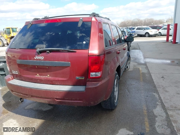 2007 Jeep Grand Cherokee Laredo with VIN 1J8HR48P37C624636, listed as a IAAI auction lot 41846326 with 222,116 mi miles. Bid and sale history available at carsss.com. Image 4.