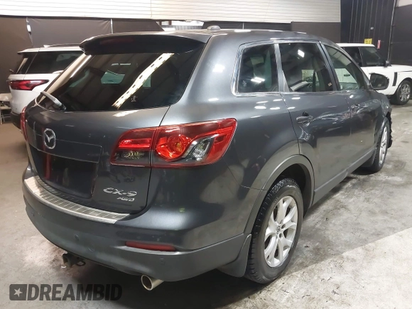 2013 Mazda CX-9 Touring z VIN JM3TB3CV0D0415199, wystawiony jako IAAI lot #42029040 z przebiegiem 154 404 mil mil oraz . Historia ofert i sprzedaży dostępna na DreamBid. Obrazek 4.