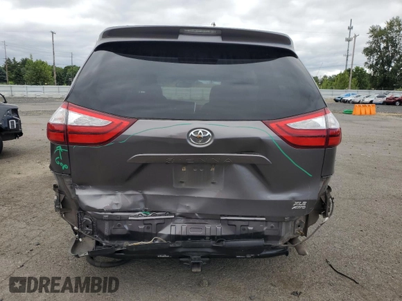 2015 Toyota Sienna Limited with VIN 5TDDK3DC4FS096402, listed as a Copart auction lot 59306665 with 117,012 mi miles and Salvage title. Bid and sale history available at DreamBid. Image 6.