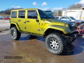 2007 Jeep Wrangler Unlimited Sahara with VIN 1J4GA59187L189519, listed as a IAAI auction lot 41204036 with 165,428 mi miles and . Bid and sale history available at DreamBid. Image 1.