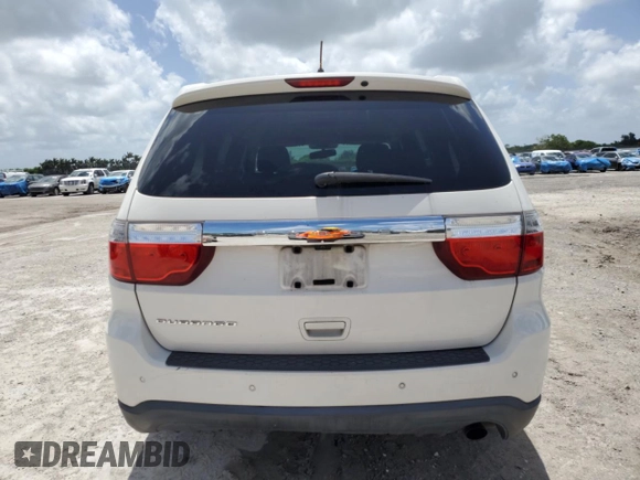 2012 Dodge Durango SXT z VIN 1C4RDHAG0CC329788, wystawiony jako Copart lot #61101745 z przebiegiem 208 302 mil mil oraz Szkoda całkowita • Salvage title. Historia ofert i sprzedaży dostępna na DreamBid. Obrazek 6.