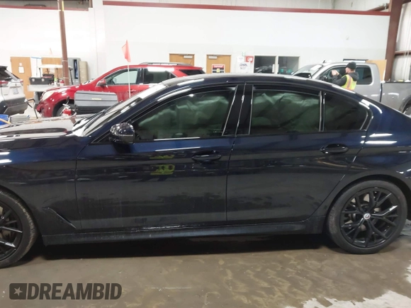 2022 BMW 5 Series 540i xDrive with VIN WBA73BJ06NWX68292, listed as a IAAI auction lot 41093254 with Not provided miles and . Bid and sale history available at DreamBid. Image 14.
