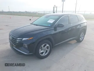 2022 Hyundai Tucson SE with VIN 5NMJA3AE7NH060409, listed as a IAAI auction lot 41884283 with 29,458 mi miles and . Bid and sale history available at carsss.com. Image 2.