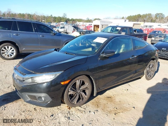 2016 Honda Civic Coupe Touring with VIN 2HGFC3B96GH357012, listed as a IAAI auction lot 41295294 with NaN miles. Bid and sale history available at carsss.com. Image 2.