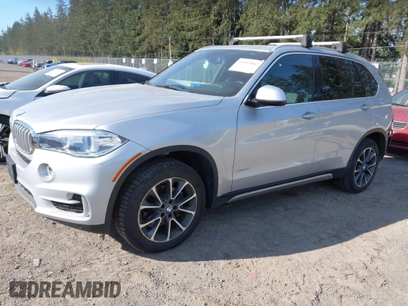 2018 BMW X5 xDrive35i with VIN 5UXKR0C52JL073889, listed as a IAAI auction lot 42035042 with 36,564 mi miles. Bid and sale history available at carsss.com. Image 22.