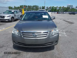2007 Toyota Avalon XL z VIN 4T1BK36B17U172307, wystawiony jako IAAI lot #42199032 z przebiegiem 169 660 mil mil oraz . Historia ofert i sprzedaży dostępna na DreamBid. Obrazek 12.