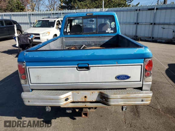 1991 Ford Ranger with VIN 1FTCR15T2MTA45652, listed as a Copart auction lot 76089874 with 90,947 mi miles and Salvage Title. Bid and sale history available at DreamBid. Image 6.