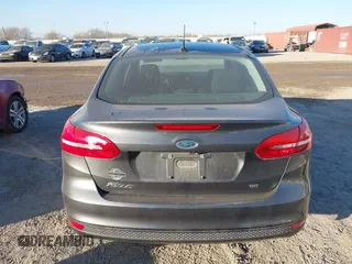 2018 Ford Focus SE with VIN 1FADP3F20JL216525, listed as a IAAI auction lot 41744383 with 92,385 mi miles. Bid and sale history available at carsss.com. Image 16.