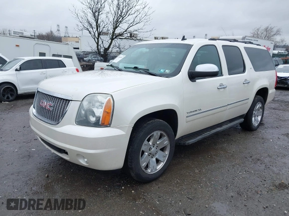 2012 GMC Yukon XL SLT with VIN 1GKS2KE77CR205341, listed as a IAAI auction lot 41565367 with 165,500 mi miles. Bid and sale history available at carsss.com. Image 2.