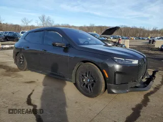 2024 BMW iX xDrive50 z VIN WB523CF02RCP06595, wystawiony jako Copart lot #44179575 z przebiegiem Nie podano mil oraz Szkoda całkowita • Salvage title. Historia ofert i sprzedaży dostępna na DreamBid. Obrazek 4.