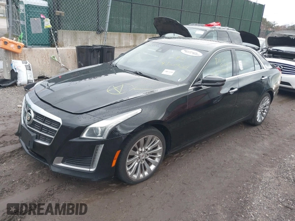 2014 Cadillac CTS Luxury AWD with VIN 1G6AX5SX9E0195923, listed as a IAAI auction lot 40946334 with Not Provided miles and . Bid and sale history available at carsss.com. Image 2.