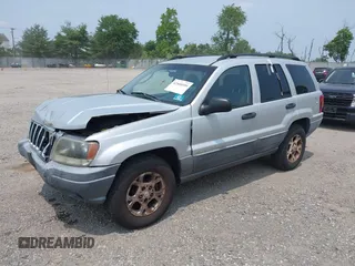 2002 Jeep Grand Cherokee Laredo with VIN 1J4GW48SX2C313093, listed as a IAAI auction lot 42446559 with 200,319 mi miles and . Bid and sale history available at DreamBid. Image 20.
