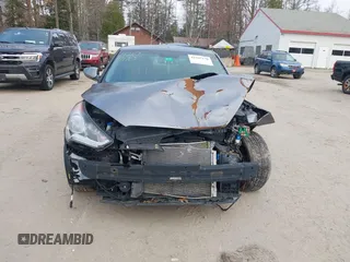 2014 Hyundai Veloster with VIN KMHTC6AD5EU183478, listed as a IAAI auction lot 42107170 with 64,905 mi miles. Bid and sale history available at carsss.com. Image 13.
