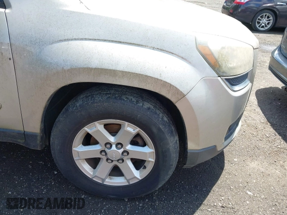 2014 GMC Acadia SLE z VIN 1GKKRNED8EJ154999, wystawiony jako IAAI lot #42279989 z przebiegiem Nie podano mil oraz . Historia ofert i sprzedaży dostępna na DreamBid. Obrazek 6.