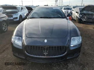 2009 Maserati Quattroporte z VIN ZAMJK39A290046644, wystawiony jako Copart lot #77969144 z przebiegiem 87 355 mil mil oraz Czysty tytuł • Clean title. Historia ofert i sprzedaży dostępna na DreamBid. Obrazek 5.