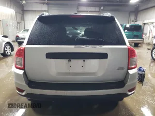 2011 Jeep Compass with VIN 1J4NT1FB7BD272109, listed as a Copart auction lot 86604064 with 0 mi miles and Salvage Title. Bid and sale history available at carsss.com. Image 6.