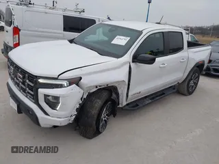2023 GMC Canyon 4WD AT4 with VIN 1GTP6DEK0P1221777, listed as a IAAI auction lot 41564754 with 21,974 mi miles. Bid and sale history available at carsss.com. Image 2.