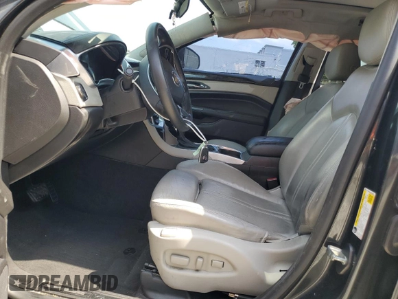 2016 Cadillac SRX Luxury Collection z VIN 3GYFNBE38GS567063, wystawiony jako Copart lot #57216775 z przebiegiem 95 413 mil mil oraz Szkoda całkowita • Salvage title. Historia ofert i sprzedaży dostępna na DreamBid. Obrazek 7.